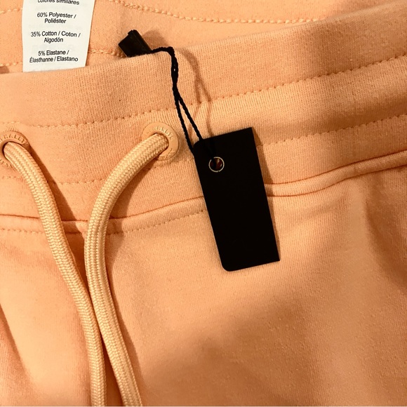 Alphalete NWPT L & S Essential Core women’s athletic shorts light orange - Picture 10 of 13